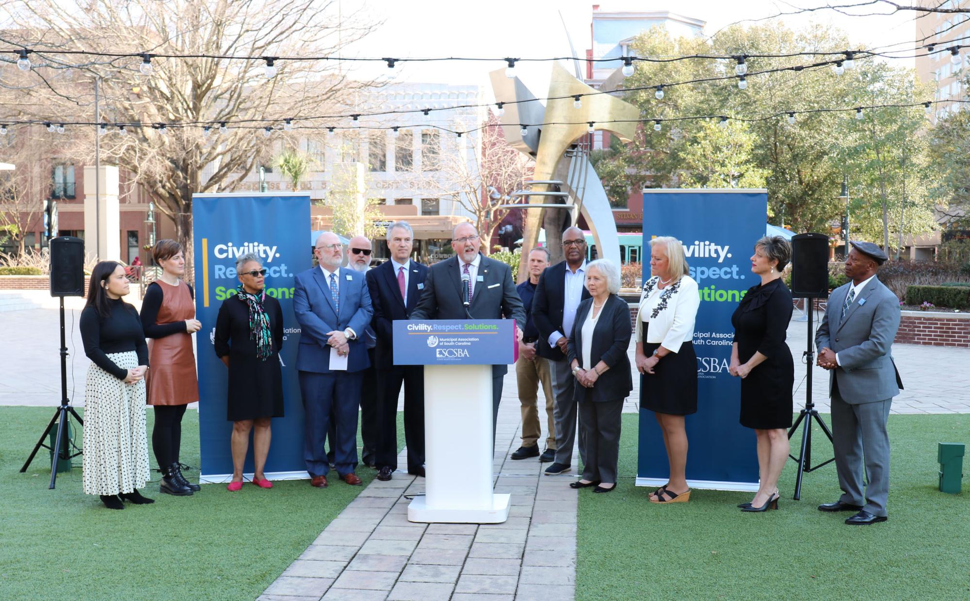 Mayor Rick Osbon, City of Aiken and president of the Municipal Association board of directors, at center during the South Carolina School Boards Association and Municipal Association of South Carolina joint civility initiative announcement. 